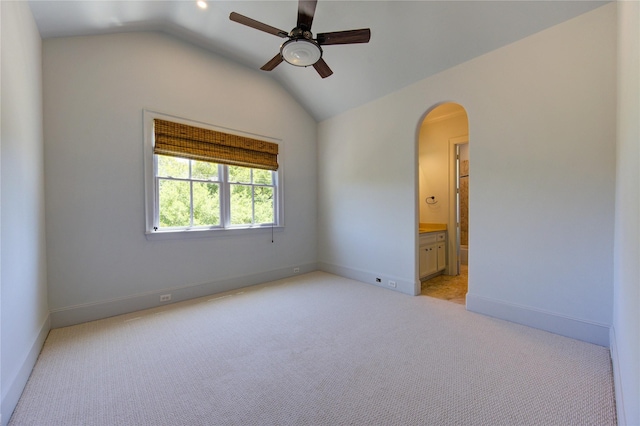 3702 Blue Bonnet, Houston, TX 77025 - spare room with vaulted ceiling, arched walkways, a ceiling fan, light carpet, and baseboards