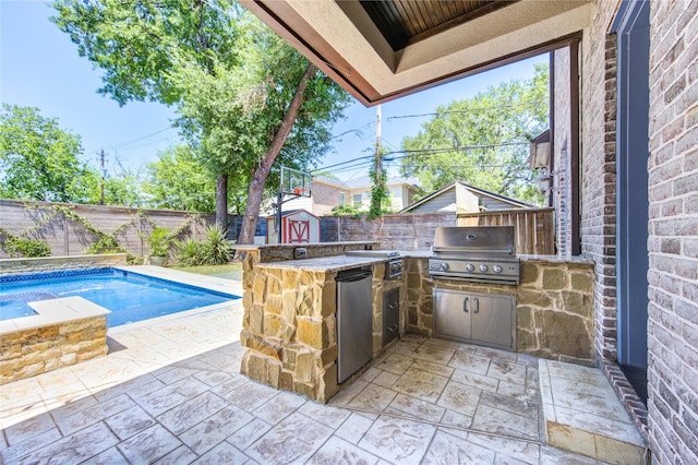 3702 Blue Bonnet, Houston, TX 77025 - view of patio featuring area for grilling, an outdoor kitchen, a fenced backyard, and a storage unit