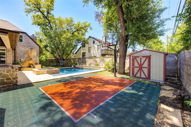 3702 Blue Bonnet, Houston, TX 77025 - view of sport court with basketball court, a shed, a fenced backyard, and a pool with connected hot tub