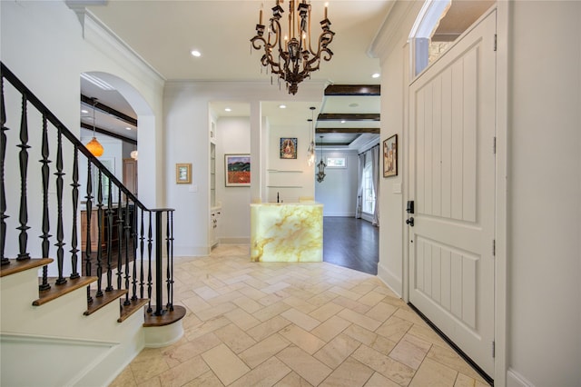 3702 Blue Bonnet, Houston, TX 77025 - foyer featuring crown molding, arched walkways, stairway, baseboards, and recessed lighting