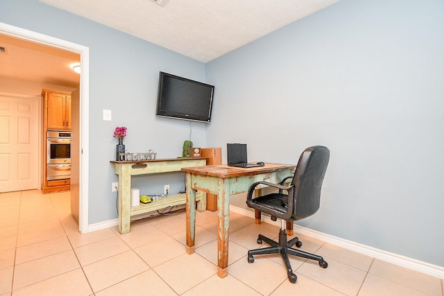 5521 Rosewood Dr, Galveston, TX 77551 - office featuring light tile patterned flooring and baseboards