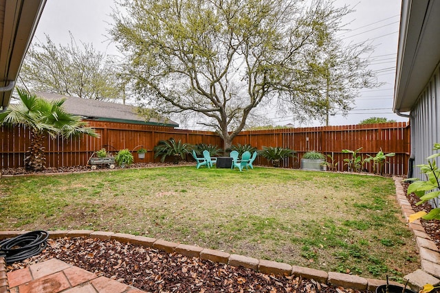 5521 Rosewood Dr, Galveston, TX 77551 - view of yard with a fenced backyard