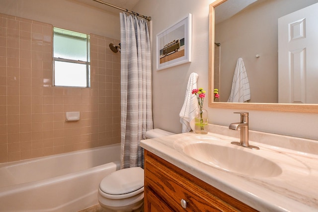 5521 Rosewood Dr, Galveston, TX 77551 - bathroom with toilet, shower / bath combo with shower curtain, and vanity