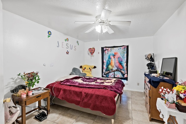 1520 Hillside Dr, College Station, TX 77845 - bedroom featuring a ceiling fan and light tile patterned flooring