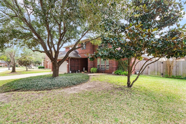 view of front of home featuring brick siding, driveway, and an attached garage
