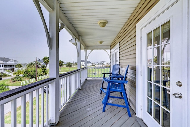9605 Teichman Rd, Galveston, TX 77554 - deck with covered porch