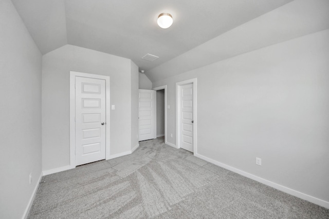 12018 Maple Oak Dr, Houston, TX 77066 - unfurnished bedroom featuring carpet flooring and lofted ceiling