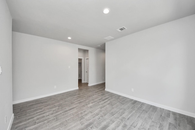 12018 Maple Oak Dr, Houston, TX 77066 - spare room featuring light wood finished floors and recessed lighting