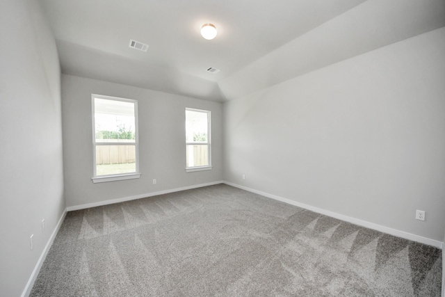12018 Maple Oak Dr, Houston, TX 77066 - empty room featuring carpet and vaulted ceiling