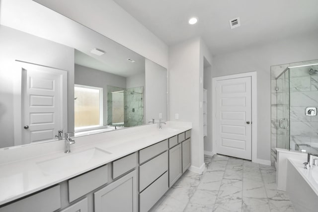 12018 Maple Oak Dr, Houston, TX 77066 - bathroom with marble look tiles, a marble finish shower, a bath, recessed lighting, and double vanity