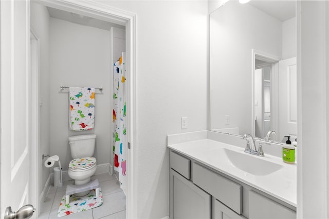 4831 Dove Cove Ln, League City, TX 77573 - bathroom with toilet, vanity, a shower with curtain, tile patterned flooring, and baseboards