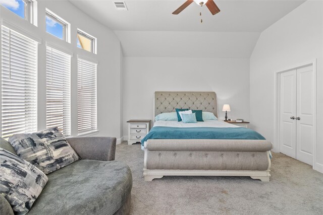 4831 Dove Cove Ln, League City, TX 77573 - bedroom with visible vents, lofted ceiling, carpet flooring, and a ceiling fan