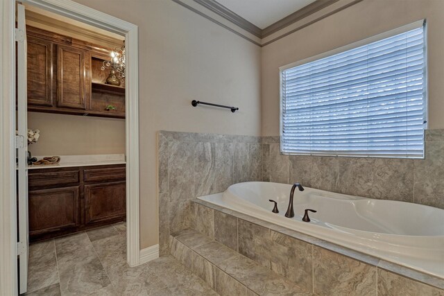 full bath with a bath, tile patterned floors, and crown molding