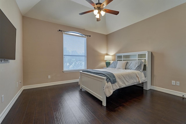bedroom featuring dark wood-style floors, lofted ceiling, baseboards, and a ceiling fan