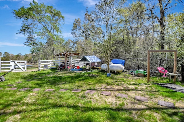 view of yard with fence