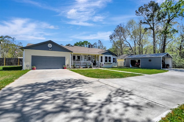 single story home featuring concrete driveway, fence, a porch, and a front yard