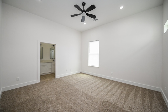 8203 Sparta St Unit B, Houston, TX 77028 - unfurnished bedroom with visible vents, baseboards, and light carpet