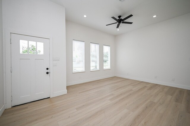 8203 Sparta St Unit B, Houston, TX 77028 - entryway with baseboards, recessed lighting, and light wood-style floors