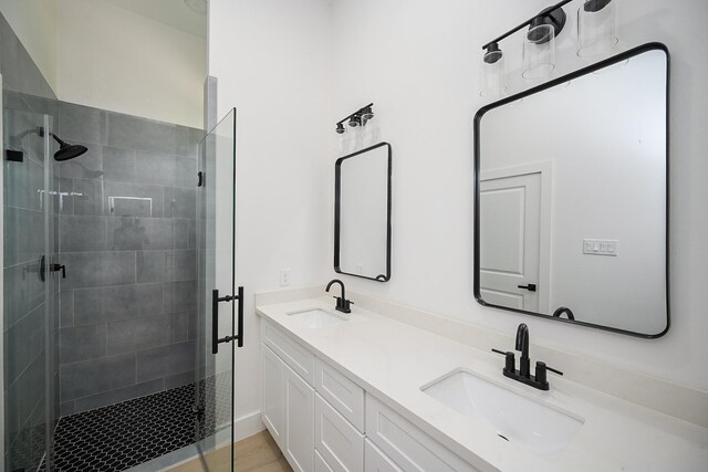 8203 Sparta St Unit B, Houston, TX 77028 - full bath with a sink, double vanity, and a stall shower