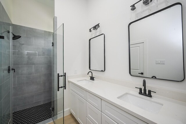 8203 Sparta St Unit B, Houston, TX 77028 - full bathroom with a sink, double vanity, and a stall shower