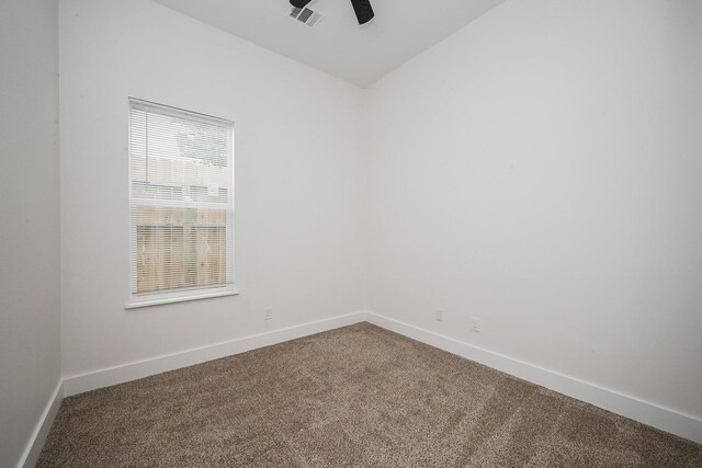 8203 Sparta St Unit B, Houston, TX 77028 - carpeted empty room featuring vaulted ceiling, visible vents, a ceiling fan, and baseboards