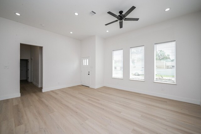 8203 Sparta St Unit B, Houston, TX 77028 - unfurnished room featuring a ceiling fan, light wood finished floors, baseboards, visible vents, and recessed lighting