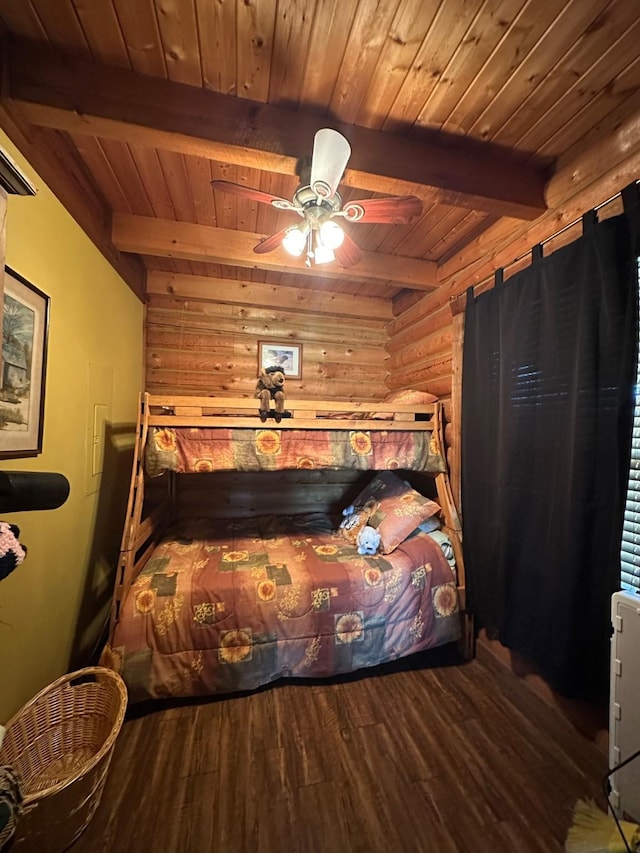 bedroom featuring wood finished floors, wooden ceiling, beam ceiling, and rustic walls