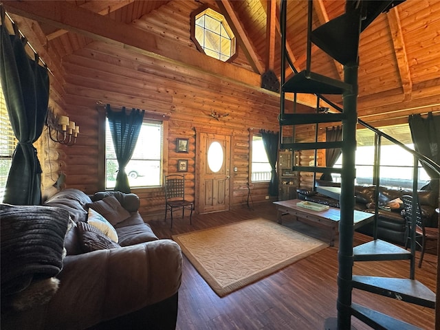 living area with high vaulted ceiling, wood ceiling, wood finished floors, log walls, and beamed ceiling