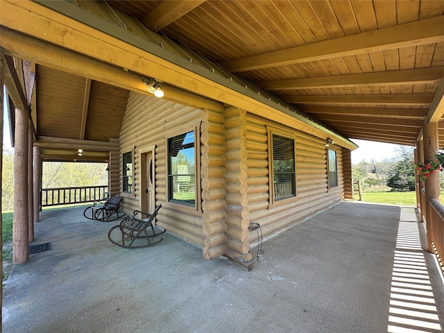 view of patio / terrace featuring covered porch and visible vents