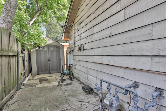 4006 Blalock Rd, Houston, TX 77080 - view of property exterior with fence, an outbuilding, and a storage unit