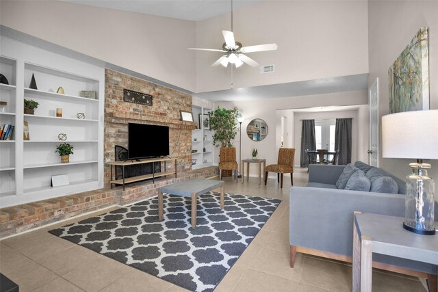 4006 Blalock Rd, Houston, TX 77080 - tiled living area featuring visible vents, a towering ceiling, baseboards, built in features, and ceiling fan