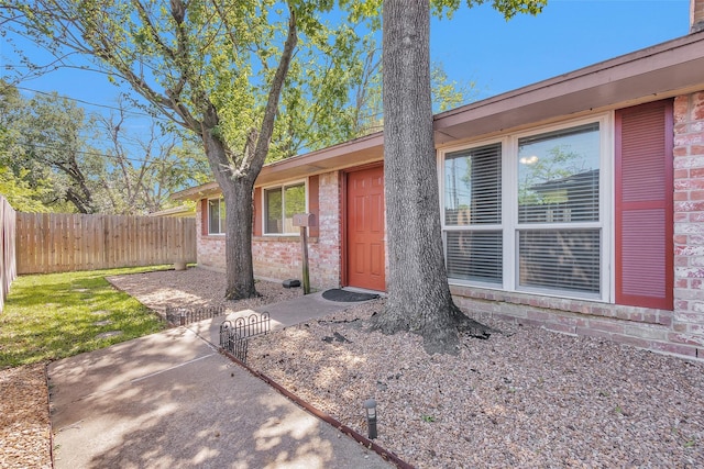 4006 Blalock Rd, Houston, TX 77080 - entrance to property with brick siding, fence, and a patio area