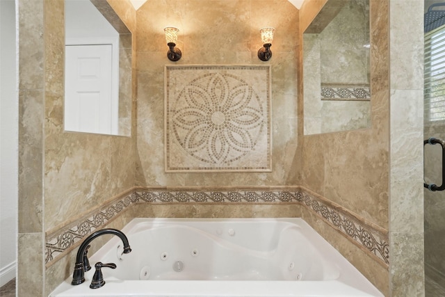 bathroom with a jetted tub
