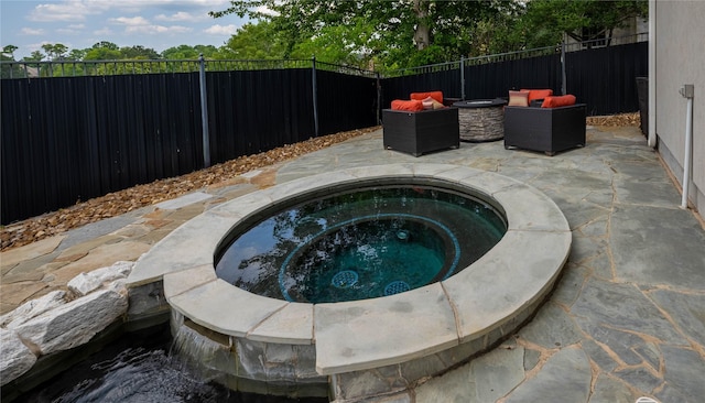 98 Victoria Dr W, Montgomery, TX 77356 - view of pool featuring a patio, a fire pit, a fenced backyard, and an in ground hot tub