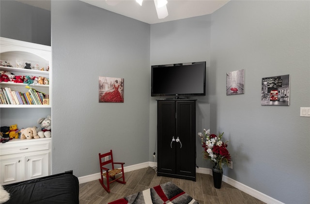 98 Victoria Dr W, Montgomery, TX 77356 - interior space with baseboards, ceiling fan, and wood tiled floor