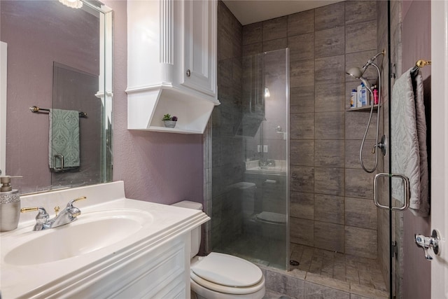 98 Victoria Dr W, Montgomery, TX 77356 - full bath featuring toilet, vanity, and a shower stall