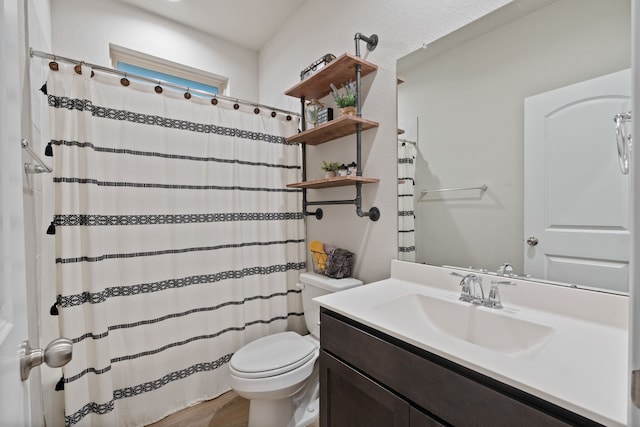 1144 Courteous Creek Dr, Montgomery, TX 77316 - full bath featuring toilet, wood finished floors, vanity, and a shower with shower curtain