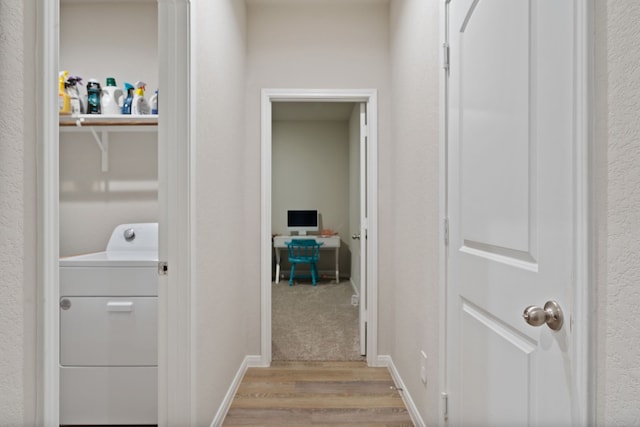 1144 Courteous Creek Dr, Montgomery, TX 77316 - corridor with washer / clothes dryer, an office area, wood finished floors, and a textured wall