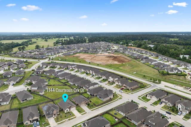 1144 Courteous Creek Dr, Montgomery, TX 77316 - aerial view of property and surrounding area with nearby suburban area