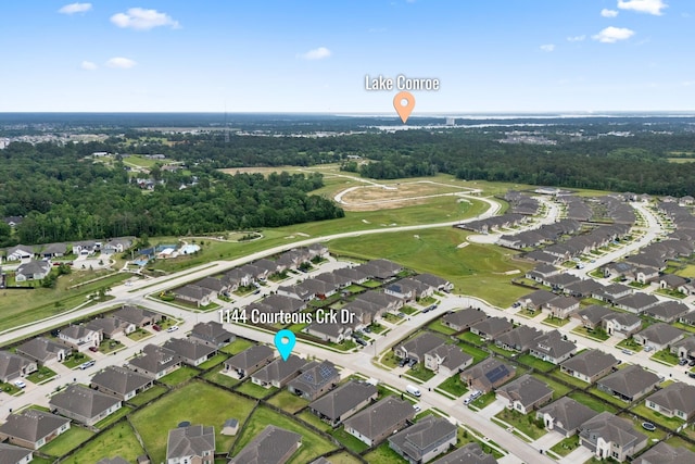 1144 Courteous Creek Dr, Montgomery, TX 77316 - aerial view of property's location with nearby suburban area