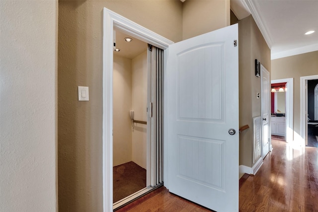 1306 Outrigger, Tiki Island, TX 77554 - hallway featuring wood finished floors, ornamental molding, and recessed lighting