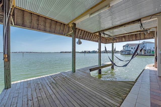 1306 Outrigger, Tiki Island, TX 77554 - dock area with a water view and boat lift