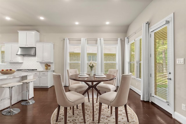 dining room with baseboards, recessed lighting, and dark wood-style floors