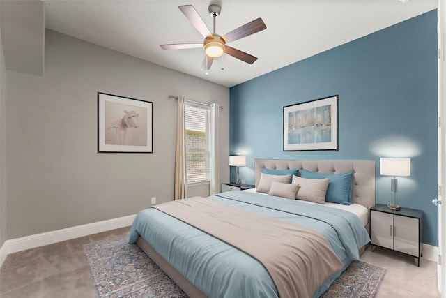 bedroom with baseboards, ceiling fan, and carpet
