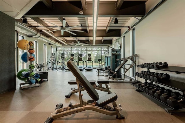 workout area with a ceiling fan