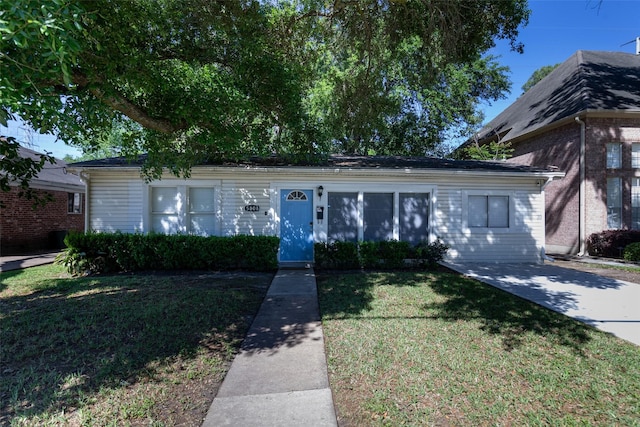 5808 Community Dr, Houston, TX 77005 - view of front of house featuring a front lawn