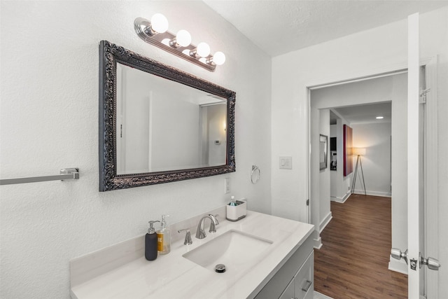 5808 Community Dr, Houston, TX 77005 - bathroom featuring wood finished floors and vanity