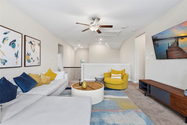 living area with carpet floors, ceiling fan, recessed lighting, and baseboards