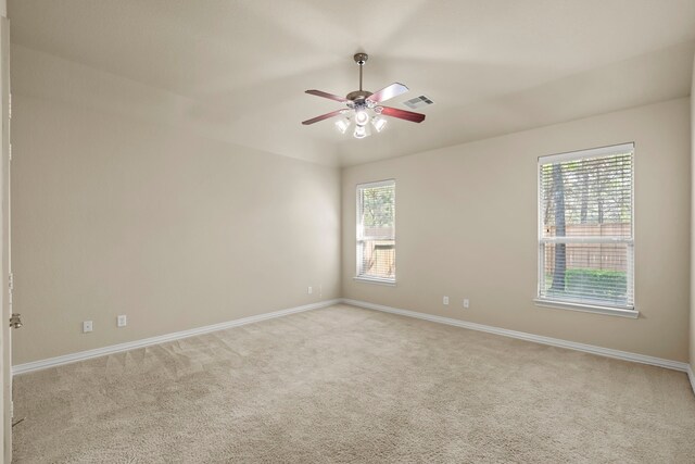 155 Pronghorn Pl, Montgomery, TX 77316 - spare room with plenty of natural light, visible vents, light carpet, and ceiling fan