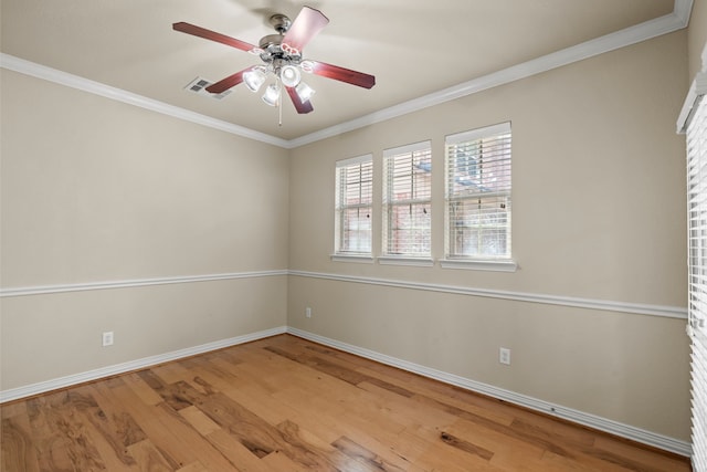 155 Pronghorn Pl, Montgomery, TX 77316 - empty room with baseboards, crown molding, wood finished floors, and ceiling fan